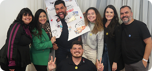 teamwork review meeting with market research data talking with documents analysis kpi information stats report people discuss analytics planning marketing strategy project